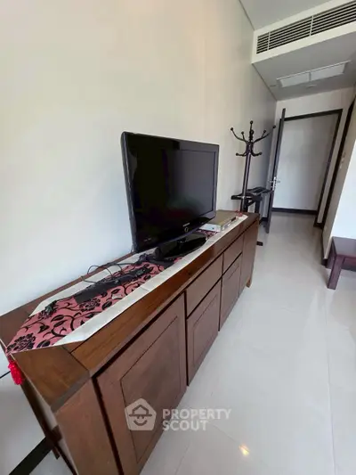 Modern living room with sleek TV stand and elegant decor