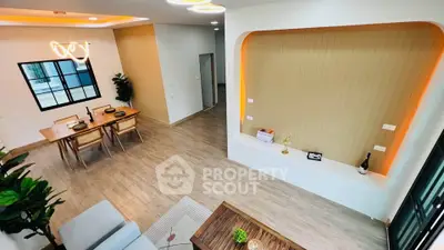 Spacious modern living room with elegant dining area and stylish decor