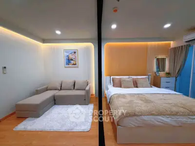 Modern bedroom with cozy sofa and stylish decor in a well-lit apartment