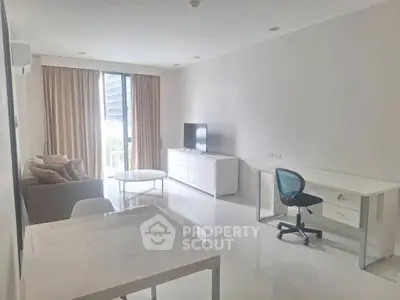 Modern living room with sleek furniture and natural light