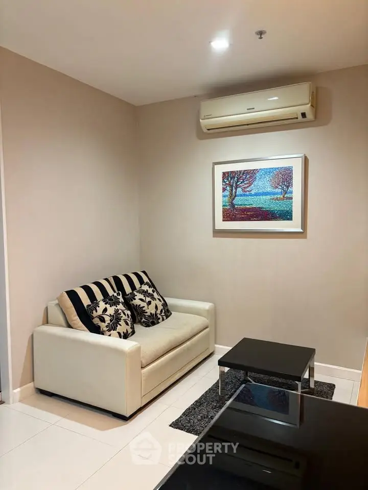 Cozy living room with modern decor and air conditioning
