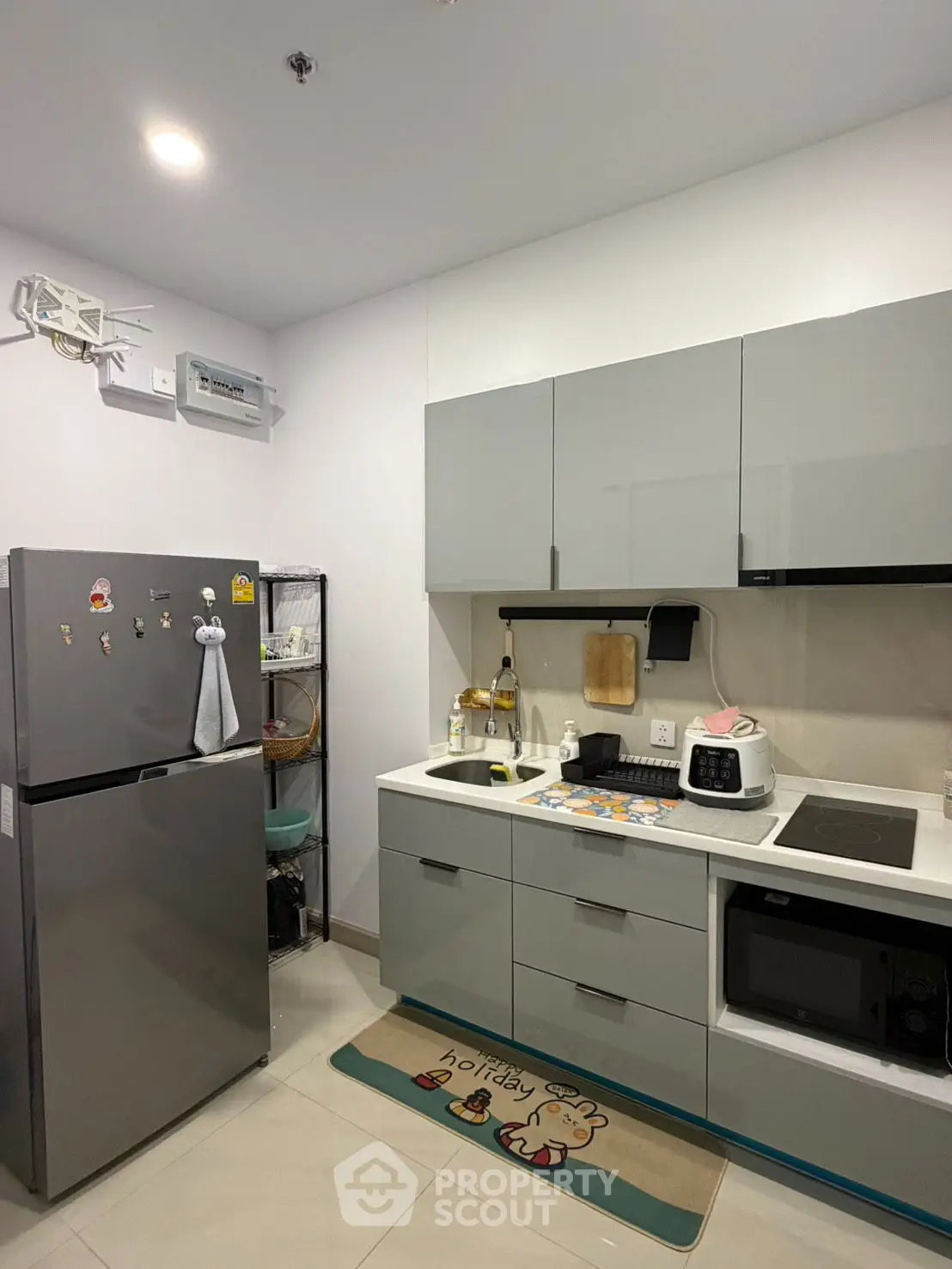 Modern kitchen with sleek appliances and stylish cabinetry