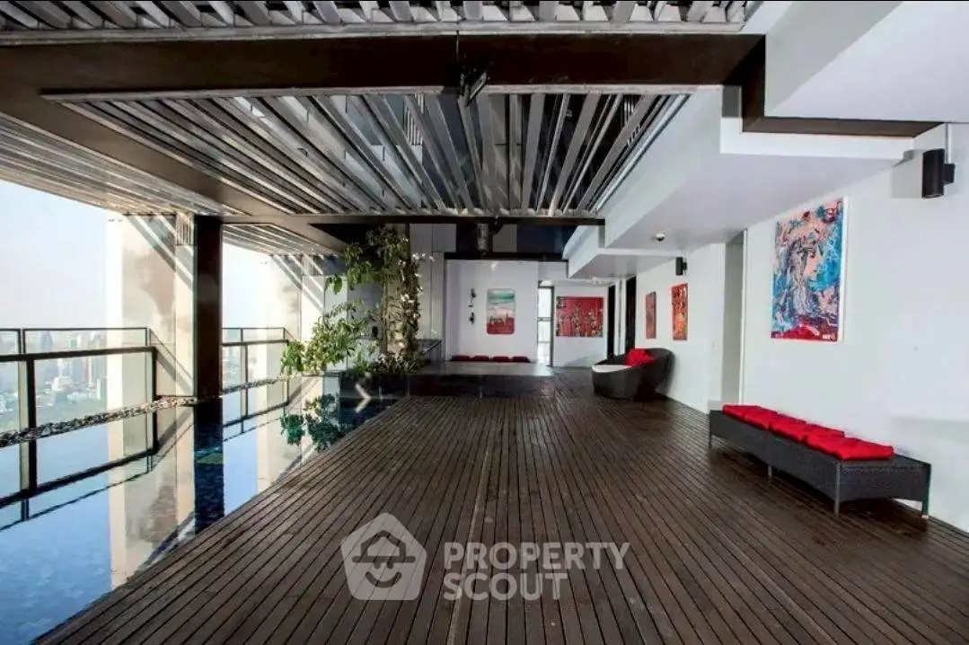 Luxurious rooftop pool area with modern design and stunning city views.