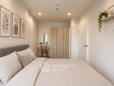 Elegant bedroom with minimalist decor and cozy ambiance, featuring a comfortable bed and stylish furniture.