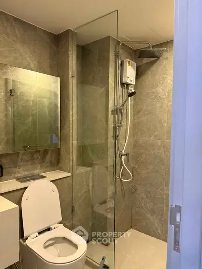 Modern bathroom with glass shower and sleek design