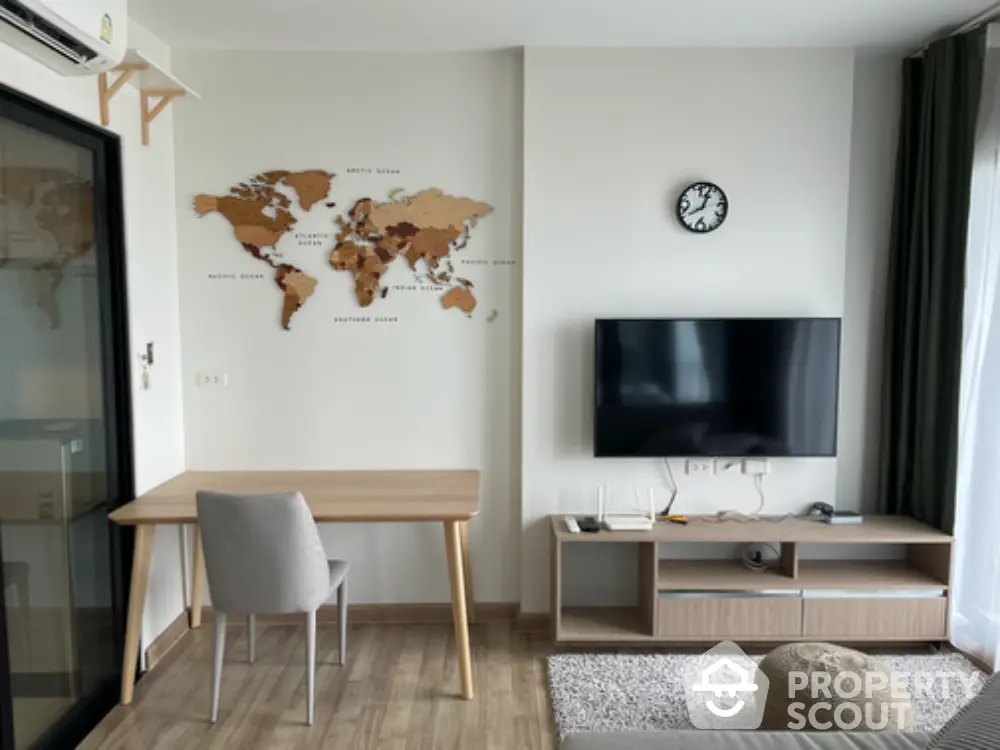 Modern living room with wall-mounted TV and world map decor