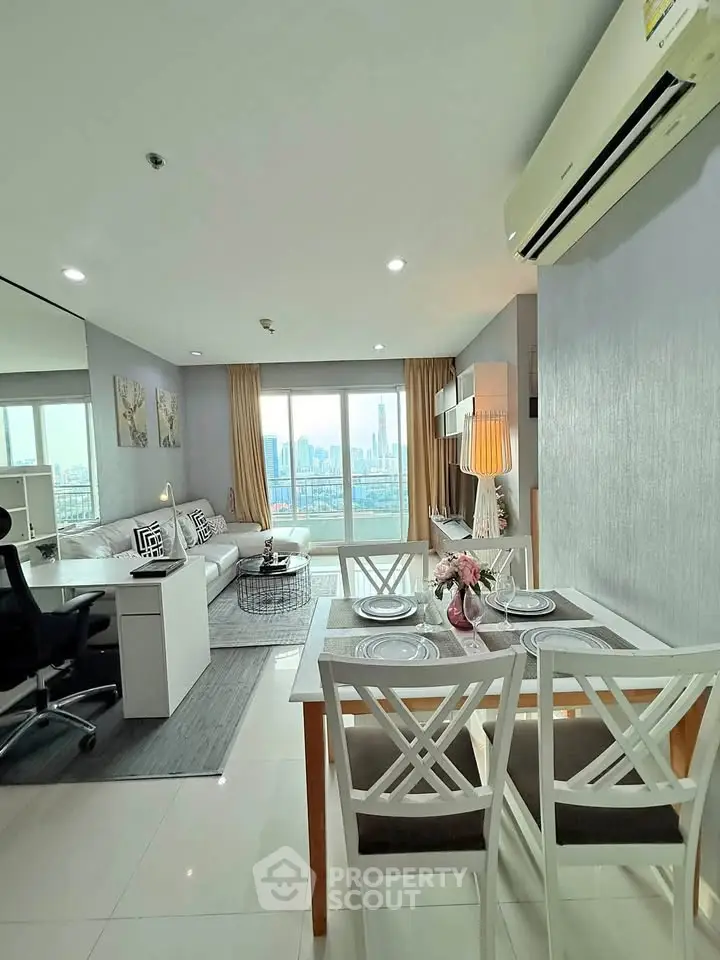Modern living room with city view, stylish decor, and dining area in a high-rise apartment.