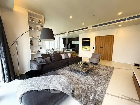 Luxurious modern living room with stylish decor and open layout, perfect for entertaining.