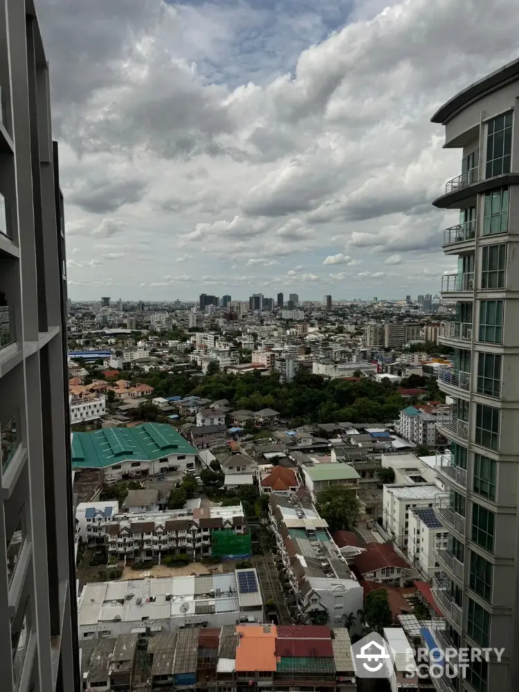 Stunning cityscape view from high-rise building balcony with expansive skyline