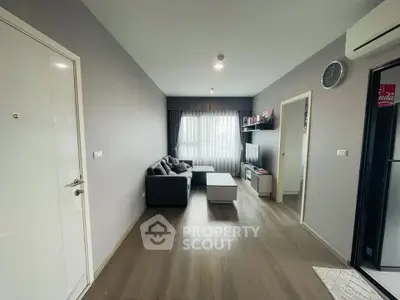 Modern living room with sleek design and cozy ambiance