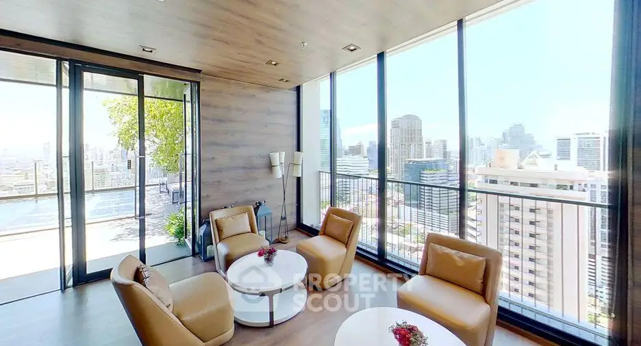 Luxurious living room with panoramic city views and elegant modern furniture.