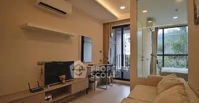 Modern living room with balcony and study area in stylish apartment