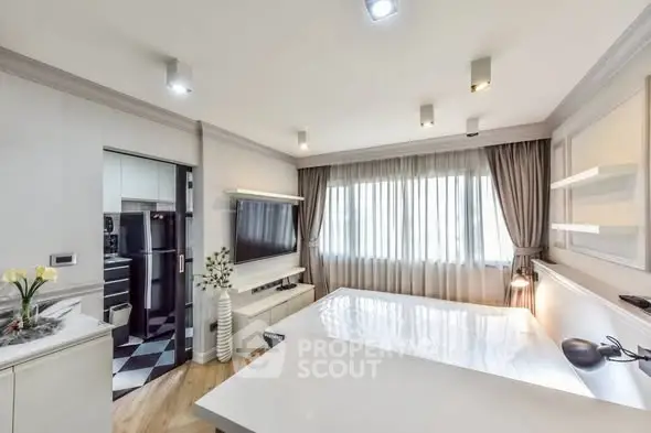 Modern living room with sleek design and large windows