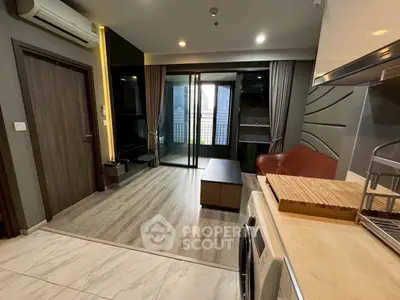 Modern living room with washing machine and stylish decor