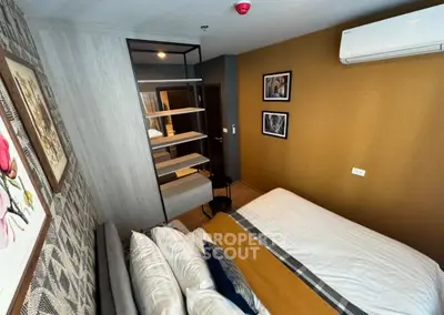 Cozy bedroom with modern decor and air conditioning unit