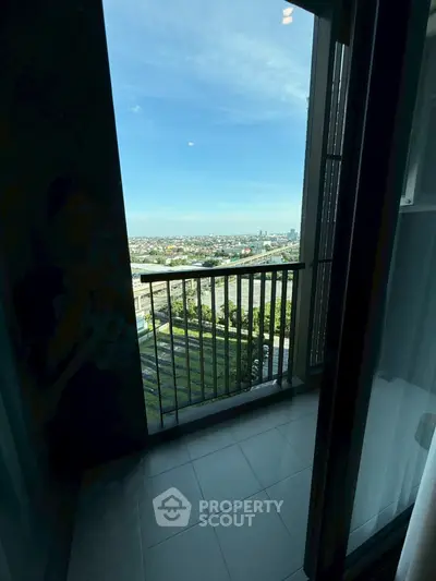 Stunning balcony view overlooking a vibrant cityscape, perfect for relaxation and enjoying the skyline.