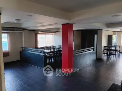 Spacious open-plan interior with modern design and ample natural light.