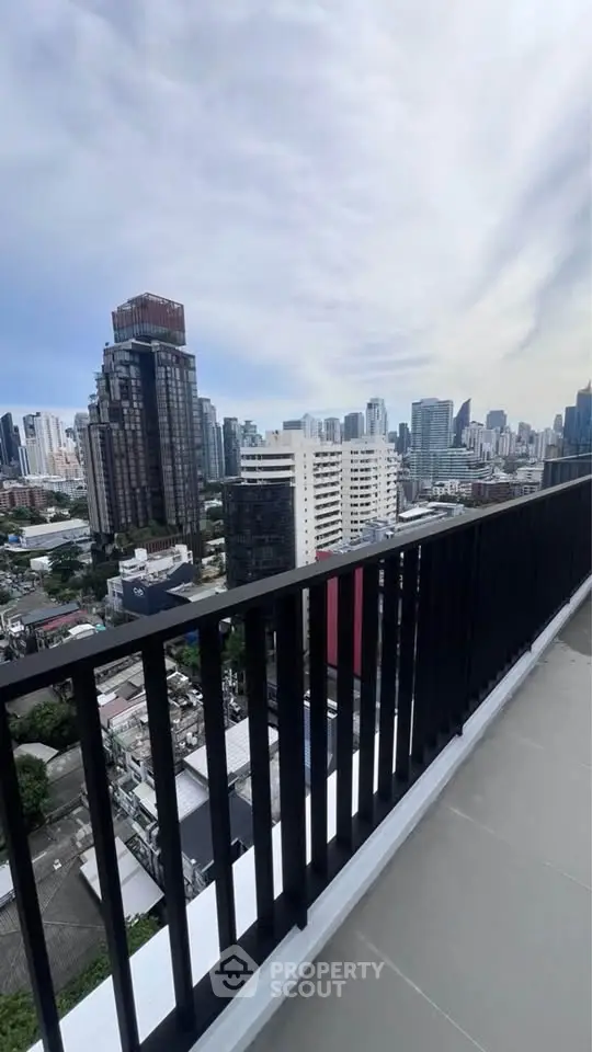 Stunning cityscape view from a high-rise balcony, perfect for urban living enthusiasts.