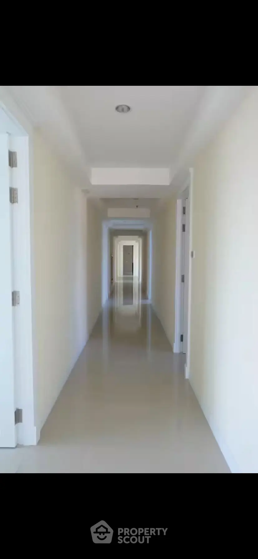 Spacious and bright corridor in modern residential building