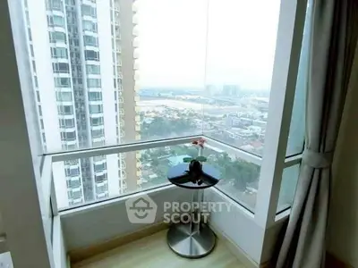 Stunning high-rise balcony with panoramic city view and modern decor