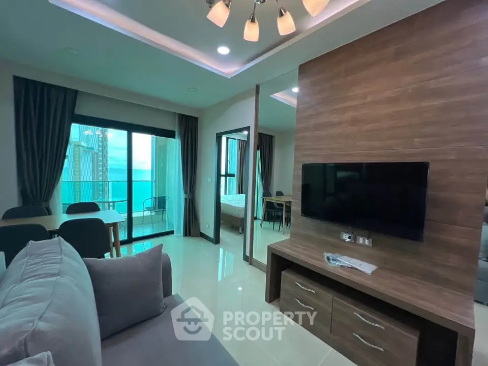 Modern living room with sea view and stylish decor in a high-rise apartment