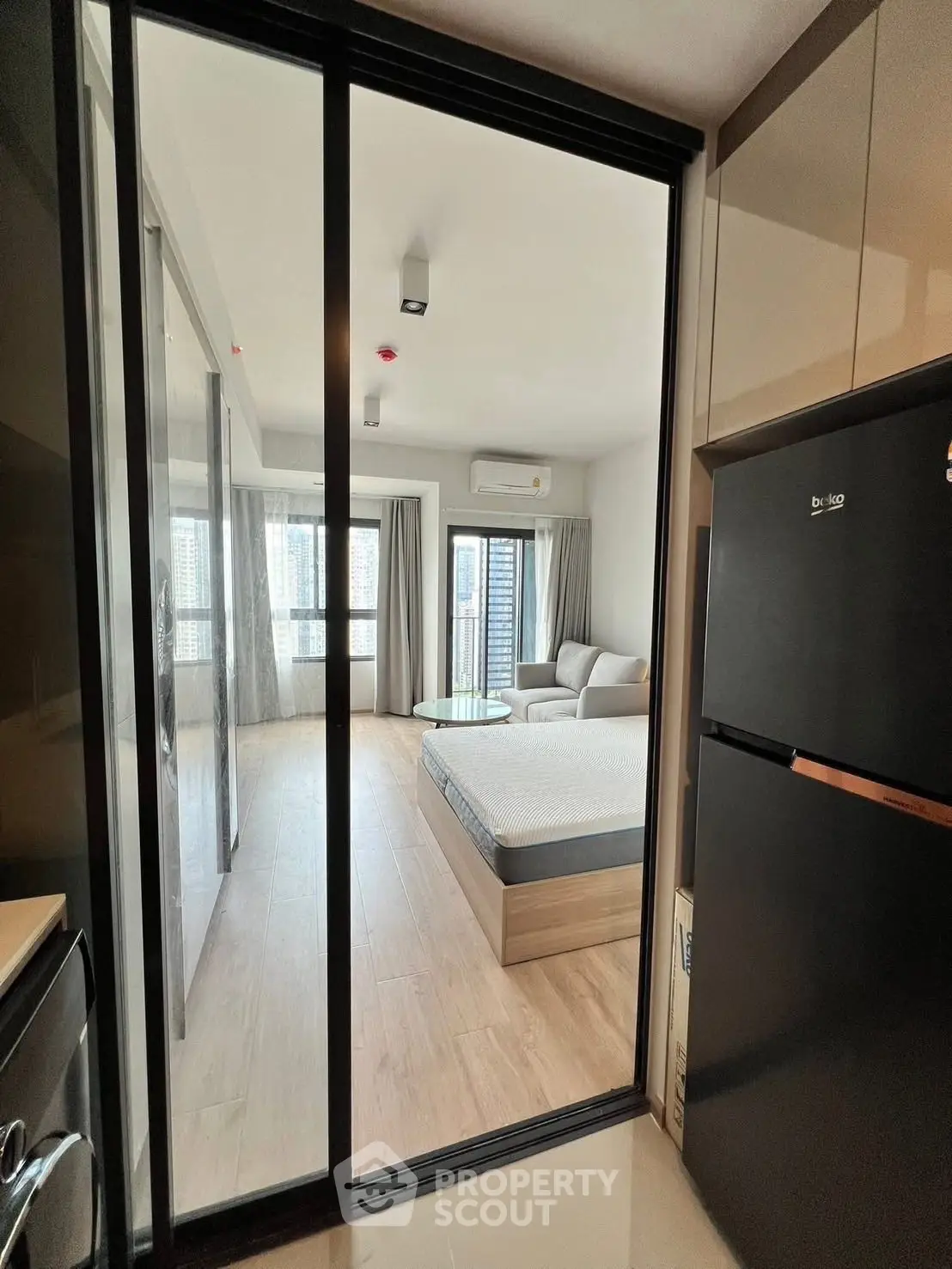 Modern studio apartment with sleek design and natural light