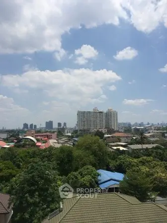 Stunning cityscape view from a high vantage point showcasing urban and natural landscapes.
