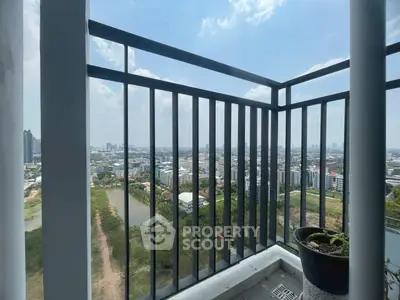 Stunning balcony view of cityscape from high-rise apartment