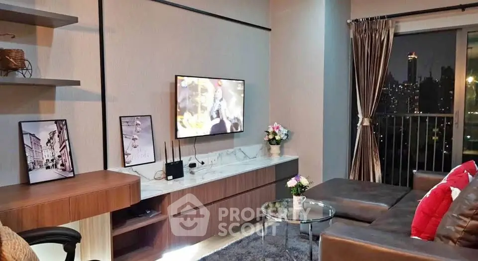 Modern living room with city view, stylish decor, and comfortable seating area.