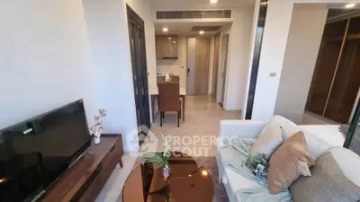 Modern living room with stylish decor and open layout in a contemporary apartment.