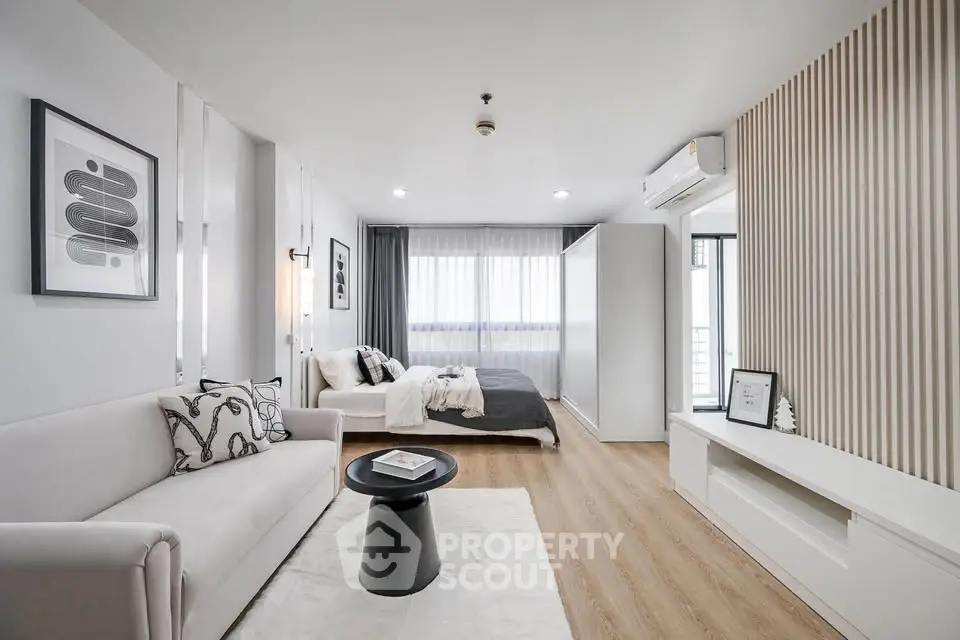 Modern studio apartment with stylish decor and natural light