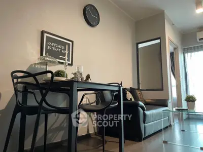 Modern living room with stylish dining area and cozy sofa, perfect for urban living.