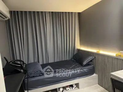Modern minimalist bedroom with sleek design and ambient lighting