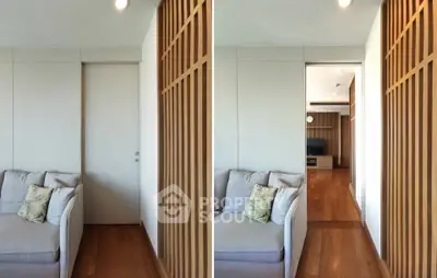 Modern living room with wooden accents and cozy sofa in a stylish apartment.