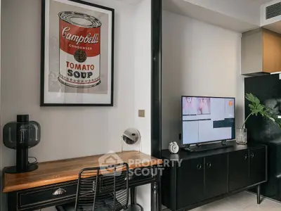 Stylish modern living room with iconic art and sleek furniture