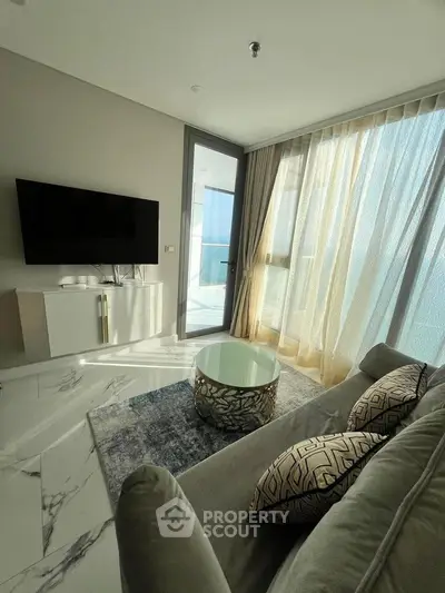 Modern living room with stylish decor and natural light in luxury apartment