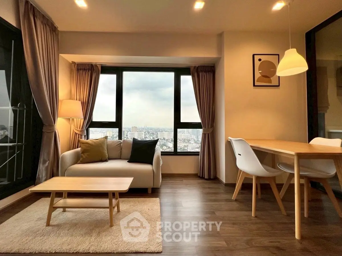 Stylish modern living room with city view, elegant furniture, and warm lighting.