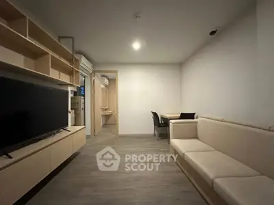 Modern living room with sleek furniture and open layout, perfect for contemporary living.
