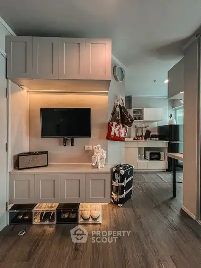 Modern living room with stylish decor and open kitchen layout