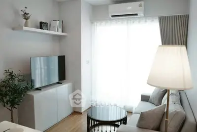 Modern living room with sleek furniture and natural light