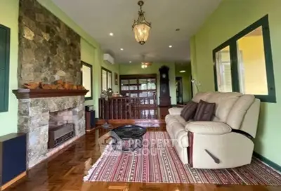 Charming living room with stone fireplace and elegant decor