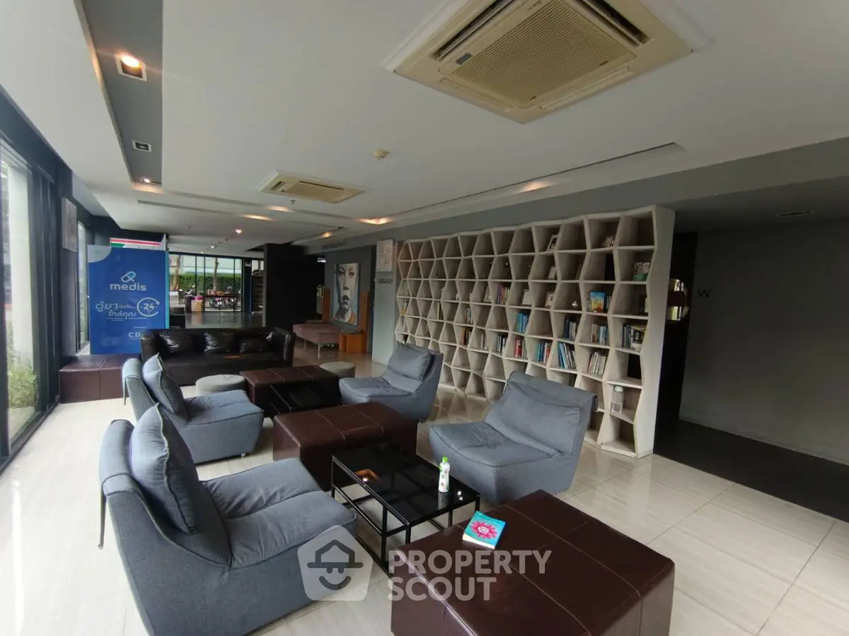 Modern library lounge with stylish seating and book display