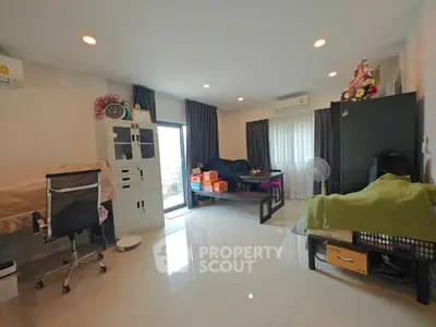 Spacious living room with modern furniture and natural light