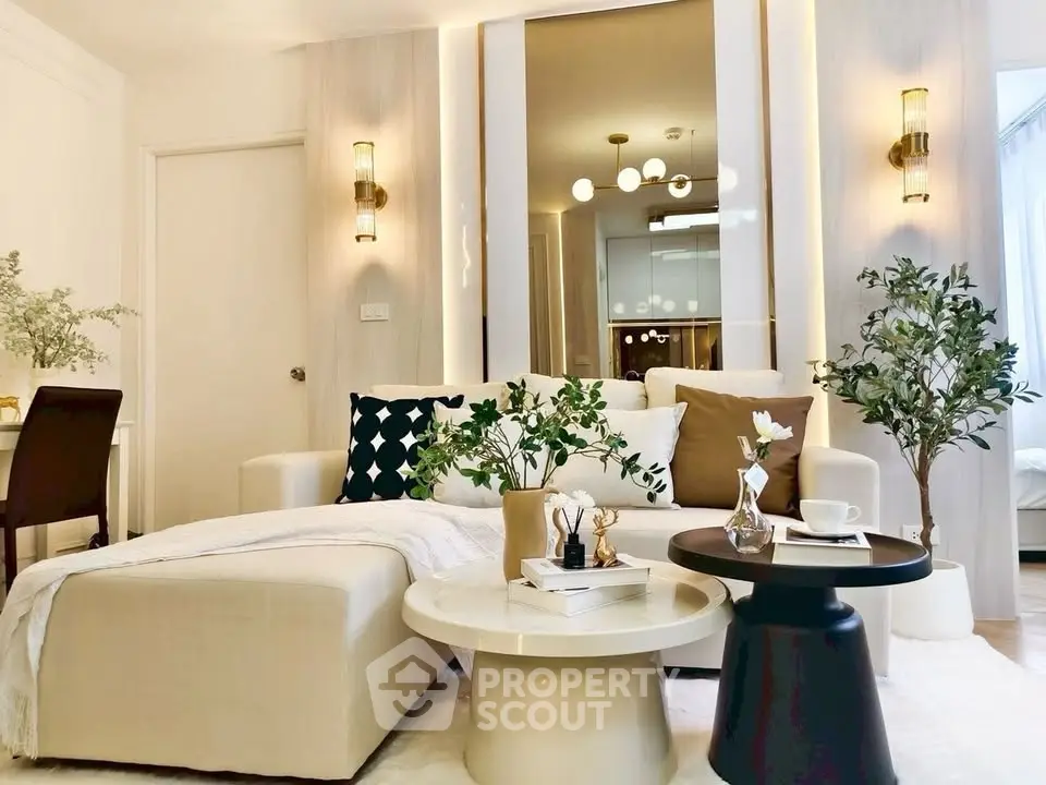 Elegant living room with modern decor, cozy seating, and stylish lighting, perfect for relaxation and entertaining.