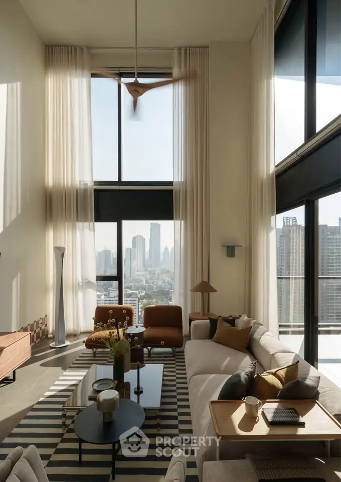 Luxurious high-ceiling living room with stunning city view and modern decor