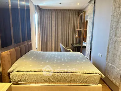 Luxurious bedroom with elegant decor and plush bedding in modern apartment