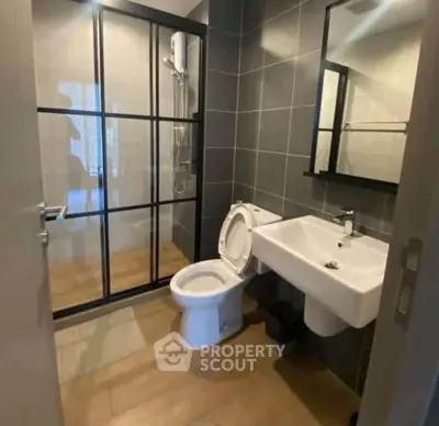 Modern bathroom with sleek design and glass shower enclosure