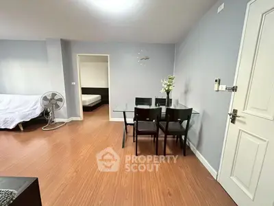 Spacious living room with dining area and modern decor