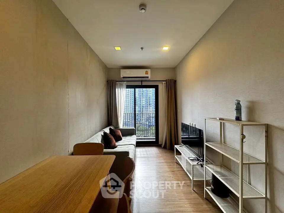 Modern living room with balcony view in a stylish apartment
