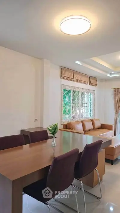 Spacious living room with modern furniture and natural light